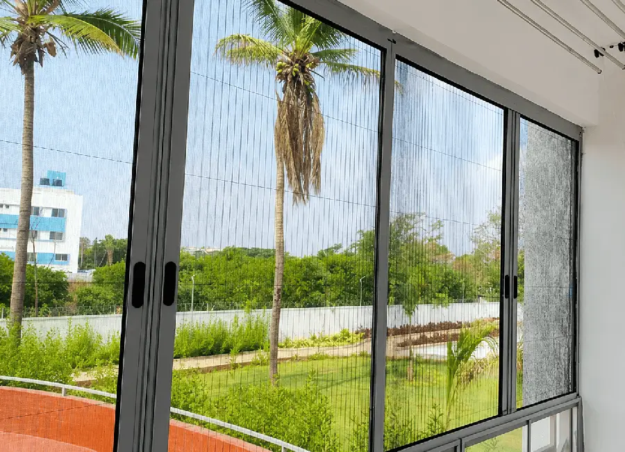 Close-up of mosquito net mesh and aluminium frame